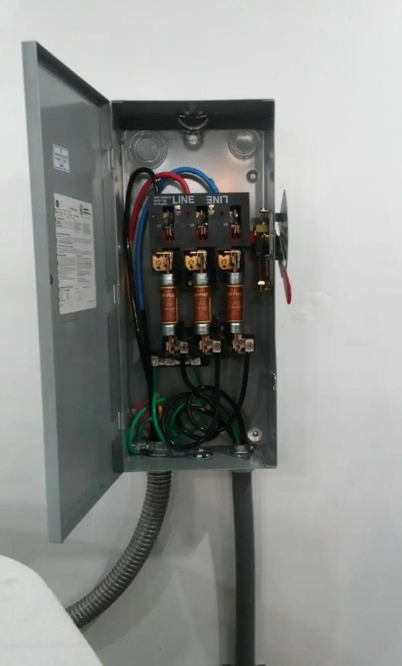 Three-phase disconnect switch installed for Smoke Detector Installation in Atkinson